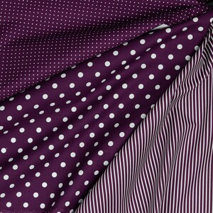 May include: Three fabric swatches with different patterns. The top swatch is a purple fabric with small white polka dots. The middle swatch is a purple fabric with large white polka dots. The bottom swatch is a purple and white striped fabric.