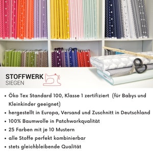 May include: Shelves filled with colorful fabric rolls, featuring various patterns and colors. A stack of patterned fabric, scissors, and a measuring tape are on the right. The text "STOFFWERK SIEGEN" and product details are visible.