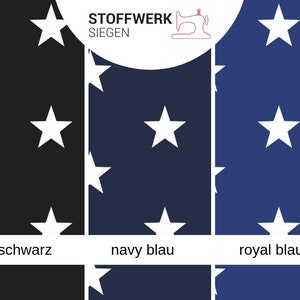 May include: A fabric swatch with a white star pattern on three different colored backgrounds: black, navy blue, and royal blue. The text "Stoffwerk Siegen" is at the top of the image.