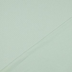May include: A light green fabric with a white polka dot pattern.