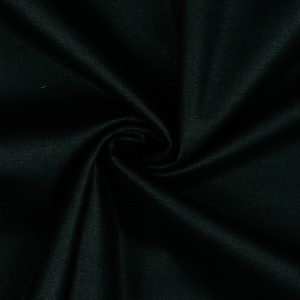 May include: Close-up of a dark green fabric with a smooth, silky texture. The fabric is folded and draped, creating soft folds and curves.