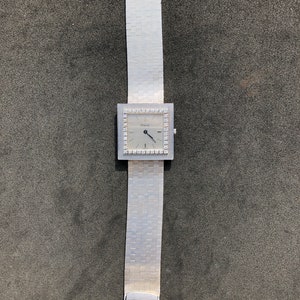 Square 18 carat gold Piaget watch and bracelet