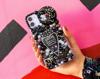Funda para teléfono con diseño de bruja, con purpurina y planchette de ouija decodificada