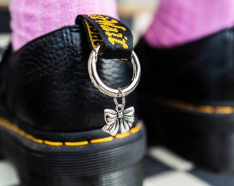 Fåniga små rosettstövelberlocker