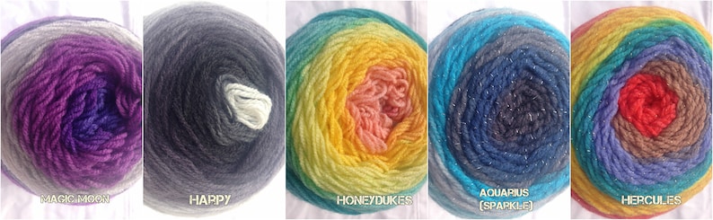 Op de afbeelding: Vijf kleurrijke garenbollen. De bollen zijn gelabeld met "MAGIC MOON", "HAPPY", "HONEYDUKES", "AQUARIUS (SPARKLE)" en "HERCULES". De garenkleuren zijn onder meer paars, grijs, blauw, geel, oranje en rood. Het garen is strak opgerold tot een bolvorm.