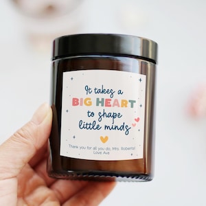 Thank you gift for nursery key workers. End of term appreciation candle gift for teachers that reads 'it takes a big heart to shape little minds'.