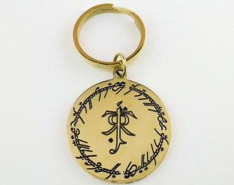 Brass keychain with the White Tree of Gondor and the Tolkien logo