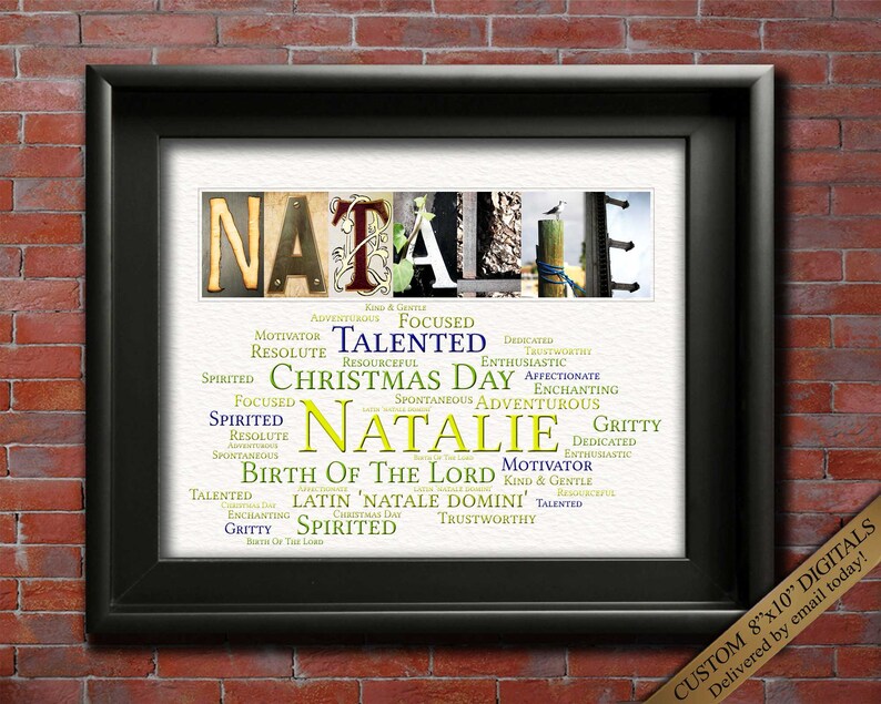 May include: A personalized name art print featuring the name "Natalie" in a colorful, layered design. The name is surrounded by words describing positive character traits, such as "talented", "spirited", and "trustworthy". The words are arranged in a word cloud style, with larger words representing more prominent traits. The print is framed in a black frame and has a white background.