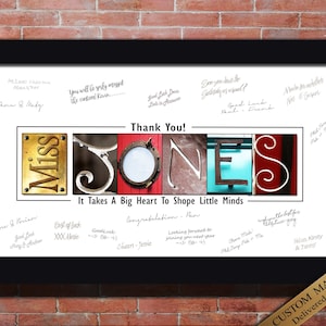 May include: A white framed print with the words "Miss Jones" spelled out in colourful letters. The letters are made from different textures and materials. The print says "It Takes A Big Heart To Shape Little Minds" and has signatures from pupils and parents.