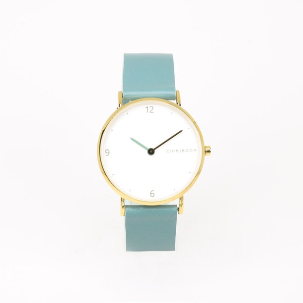 Montre femme OR en cuir turquoise et cadran blanc