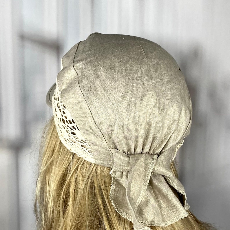 close-up view of the back of a lace linen bandana hat, showing the elasticated fit and neat finish for a secure and easy-to-wear style.