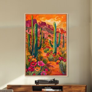 Framed Canvas Print, Vibrant Desert Scene with Saguaro Cacti and Flowers, Unique Wall Art for Living Room or Bedroom.