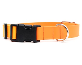 Collar impermeable de biotano para perros de color naranja mandarina: ligero y duradero.
