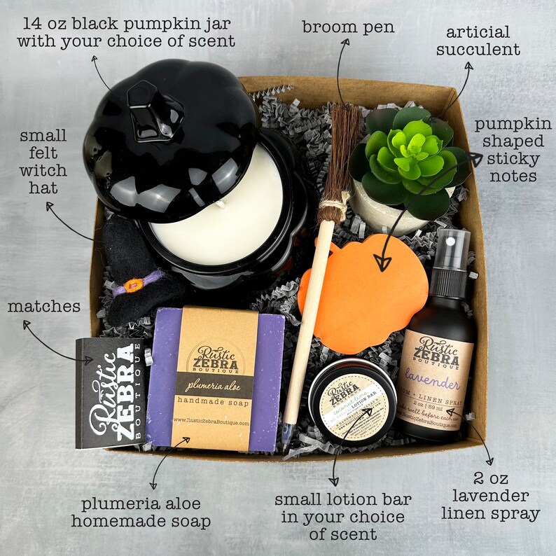 May include: A Halloween-themed gift box with a black pumpkin jar candle, a small witch hat, matches, plumeria aloe soap, a broom pen, a succulent, pumpkin-shaped sticky notes, a lotion bar, and lavender linen spray.
