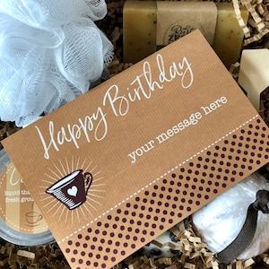 May include: A brown card with white polka dots and the text "Happy Birthday" in white script. The card has a white cup with a heart on it and the text "your message here" in white.