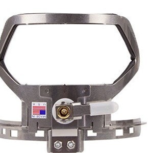 May include: A silver metal frame with a white plastic lever and a small American flag with the text "Made in USA".