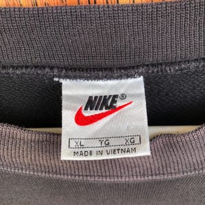 May include: A rustic wooden sign with the text "Welcome to our home" in white lettering. The sign features a distressed finish and a simple, inviting design, perfect for entryway decor.