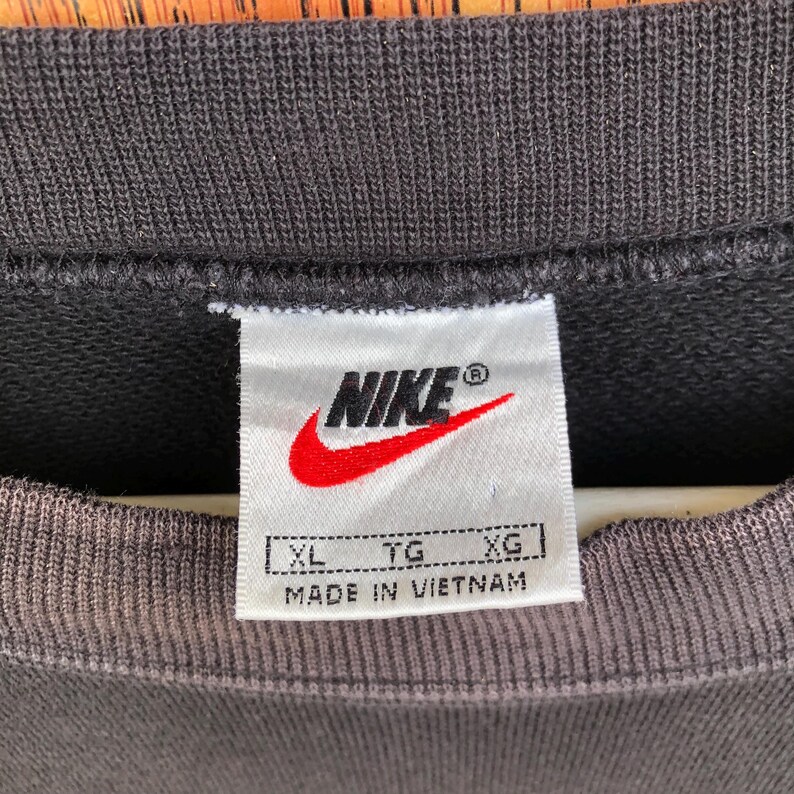 May include: A rustic wooden sign with the text "Welcome to our home" in white lettering. The sign features a distressed finish and a simple, inviting design, perfect for entryway decor.