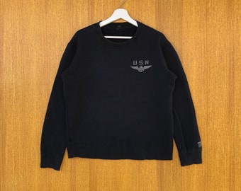 Sudadera vintage Avirex USA Spellout con cuello redondo y diseño de jersey