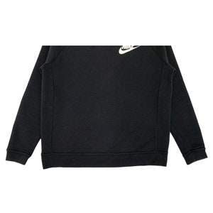 May include: Black sweatshirt with a white Nike logo on the chest.