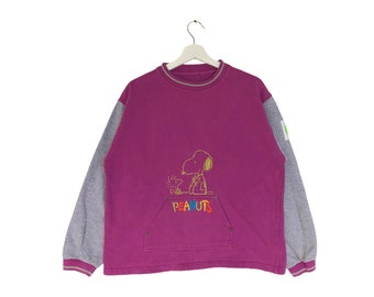 Sudadera vintage rara de Peanuts Cartoon Network con bordado y letras, color morado, cuello redondo.