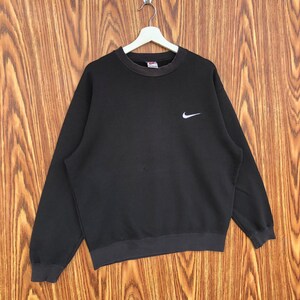 May include: A set of three ceramic mugs with a speckled, matte finish. The mugs are in shades of cream, light gray, and dark gray. Each mug has a simple, minimalist design, perfect for coffee or tea.