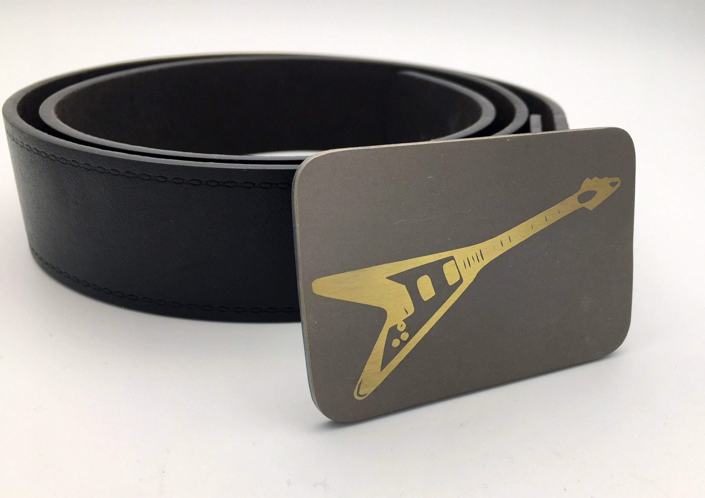 designer belt with guitar buckle