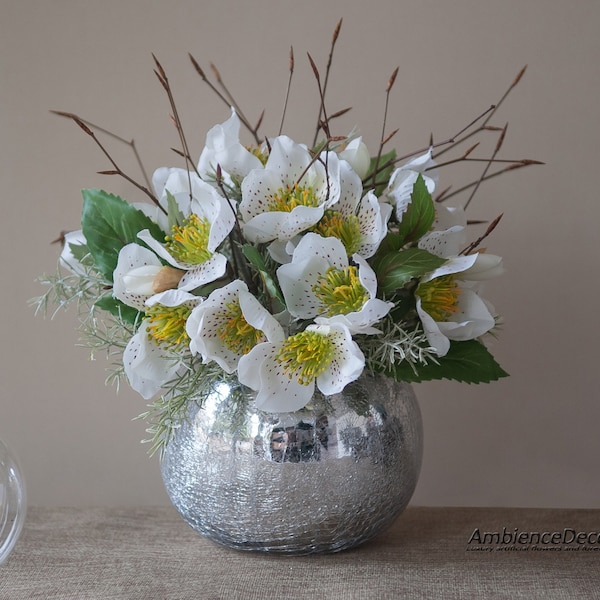 Christmas flower  centrepiece for table. Hellebores Winter centerpiece.