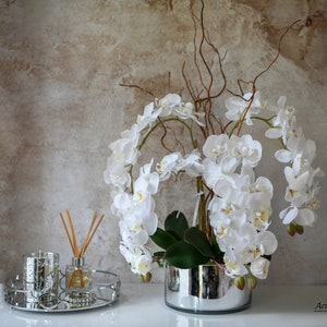 Lifelike White Orchid Arrangement: Phalaenopsis in Silver Vase