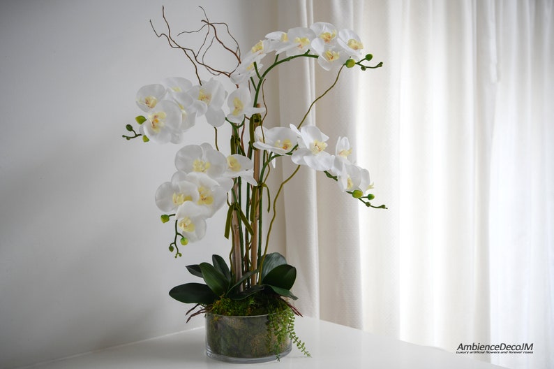 Orchid arrangement -Faux orchids in a glass bowl