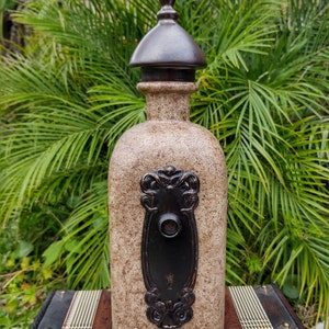 Botella de placa de llave de metal