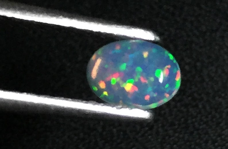 7x5 mm Ethiopian opal loose gemstone. Ethiopian opal oval cabochon natural welo Ethiopian opal Multi flash cabochon