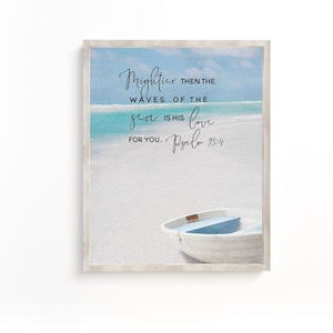 May include: A watercolor painting of a beach scene with a white boat on the sand. The text "Mightier then the waves of the sea is his love for you. Psalm 93:4" is written on the image.
