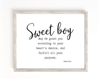 May include: A framed print with a white background and black text. The text reads "Sweet boy" and includes a Bible verse from Psalm 20:4. The verse reads "May He grant you according to your heart's desire, And fulfill all your purpose."