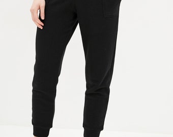 Black and crimson sports pants