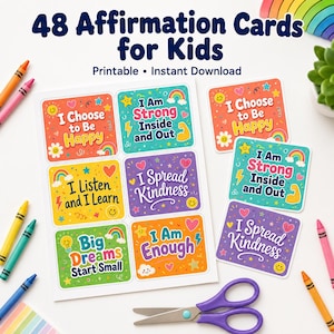 May include: A set of 48 affirmation cards for kids featuring colorful designs with text including I Choose to Be Happy, I Am Strong Inside and Out, I Listen and I Learn, I Spread Kindness, Big Dreams Start Small, and I Am Enough with crayons.