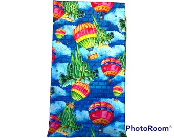 1 yard Wizard of Oz - Cotton Woven Blue brick background with Balloon and Emerald City.