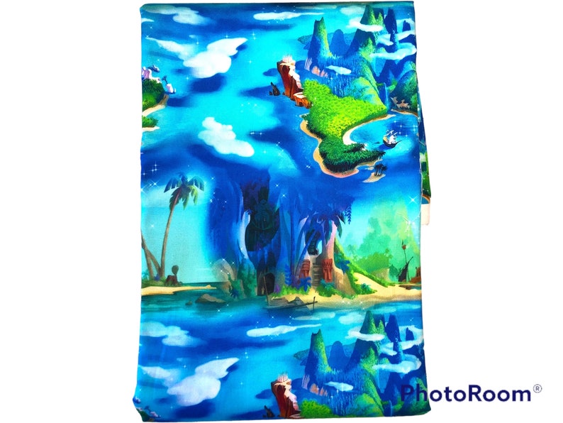 Peter Pan Fabric 1 yard cotton woven. Featuring blue background and Treasure Island. image 1