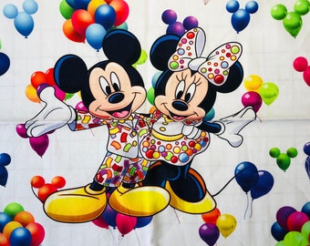 Mickey and Minnie celebrates with balloons!