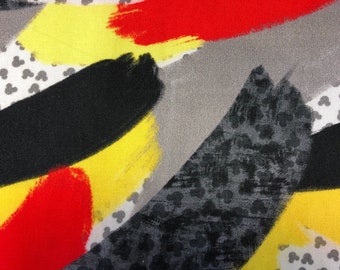 1 Yard Red Yellow Grey Cotton Woven Beautiful fabric Including Mickey Motifs.