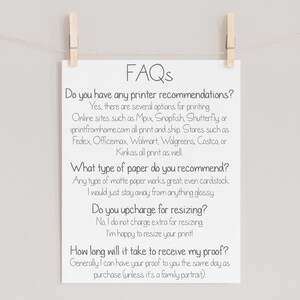 May include: A white rectangular print hanging from a string with two wooden clothespins. The print features black text titled FAQs, addressing printer recommendations, paper types, resizing charges, and proof delivery timelines for digital prints.
