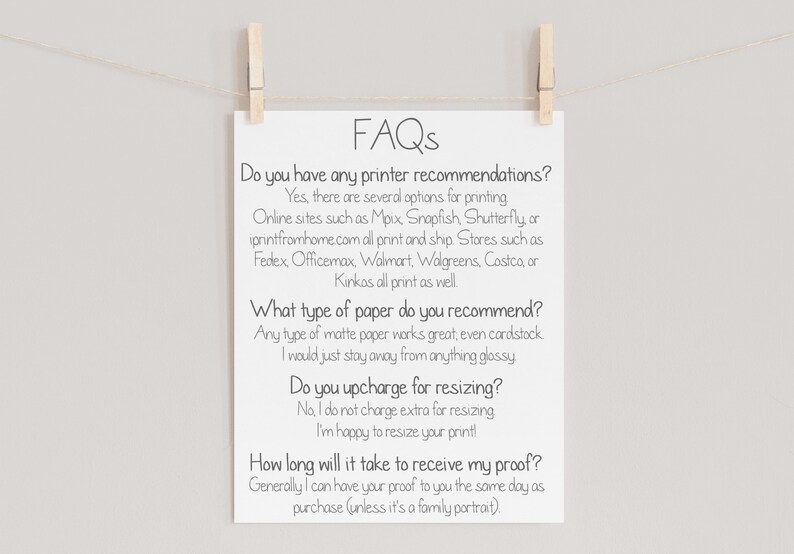 May include: A white rectangular print hanging from a string with two wooden clothespins. The print features black text titled FAQs, addressing printer recommendations, paper types, resizing charges, and proof delivery timelines for digital prints.