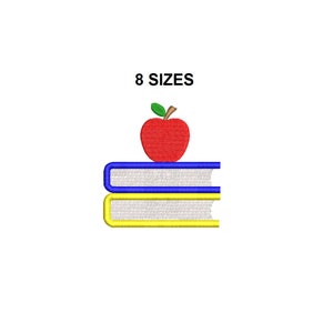 Puede incluir: Una manzana roja con un tallo y una hoja verdes se encuentra encima de una pila de dos libros. El libro de arriba es azul y el libro de abajo es amarillo.
