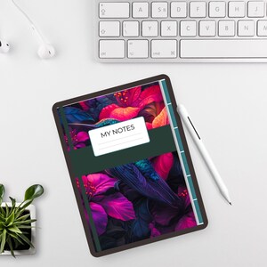 以下が含まれることがあります： ピンク、赤、青の花柄のデジタルタブレット。タブレットには、白いラベルに「MY NOTES」というテキストが入った濃い緑色のバンドが付いています。白いスタイラスとキーボードも表示されています。