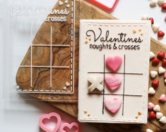 Valentijnskoekjes uitsteekvormpjes en acrylembosserset met nulletjes en kruisjes