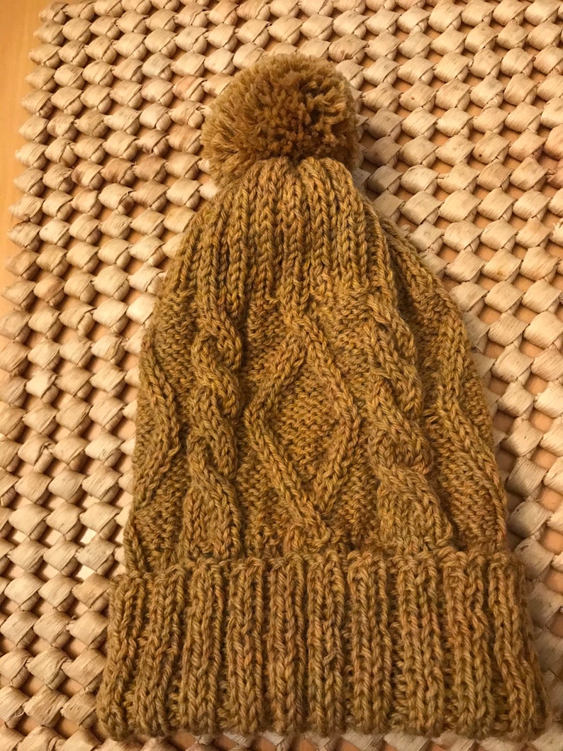 Hand-Knitted Gold Wool Cable Adult Fold-over Hat with Pom-Pom.