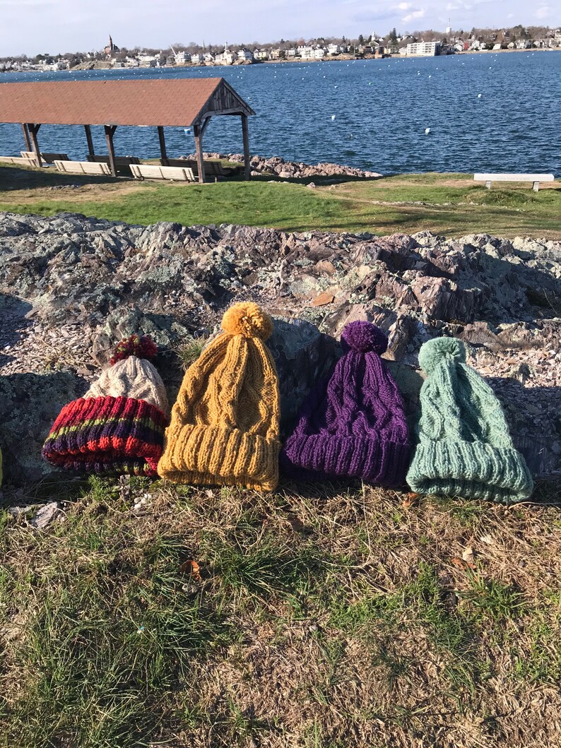 Hand-Knitted Gold Wool Cable Adult Fold-over Hat with Pom-Pom.