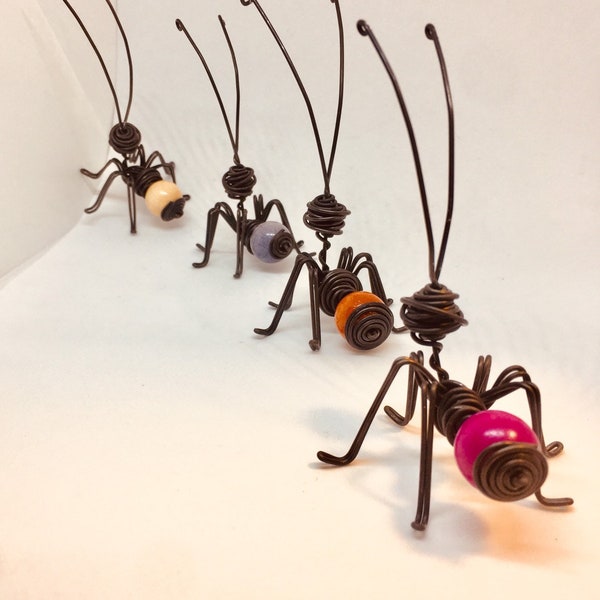 Ant with wood. wood and iron wire art. wooden balls in ant sculpture. minimalist ant