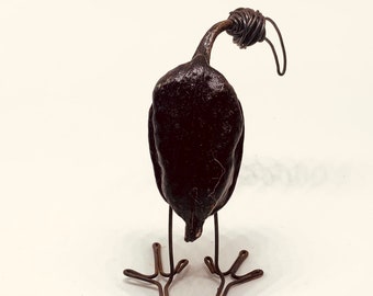 Dodo bird. Bird sculpture with wire. Bird on wire. Figure of a bird with seed. Tree pod. Organic sculpture. Bird