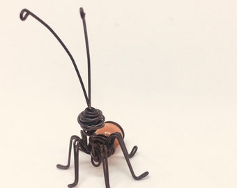 Wire sculpture of insect. Brown and black ant. Light brown. Decoration with insects. Vet Gift